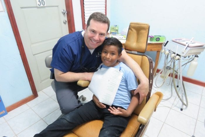 Dr. Garpetti with patient in Belize